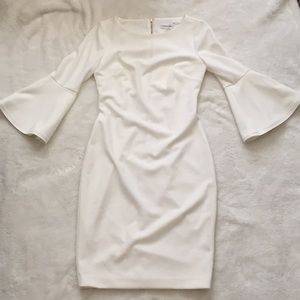 white calvin klein bell sleeved dress
